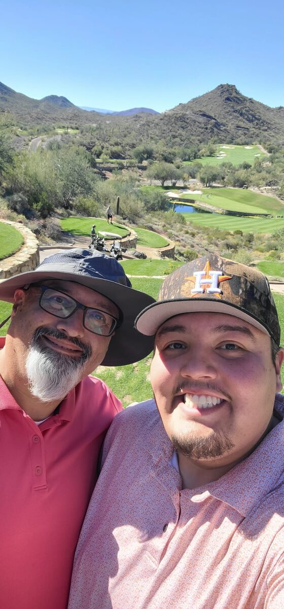 Aaron golfing with his dad in Arizona