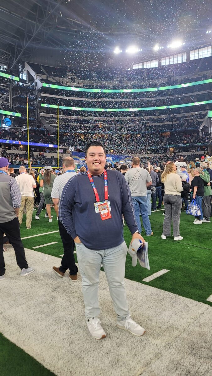 Aaron on the field at the Cotton Bowl